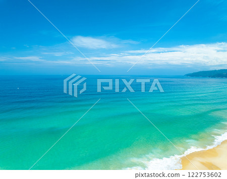 Aerial view of blue sea surface water texture background,Sun reflections on water, Aerial flying drone view Waves water surface texture on sunny tropical ocean in Phuket island Thailand 122753602