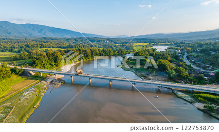 Cement bridge over Omkoi river in Northern Thailand. Cement bridge is very stronger for transportation, travel and development. Cement bridge over Omkoi river in Northern Thailand. Cement bridge is very stronger for transportation, travel and development. 122753870