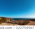 A clear sky, sea and mountains seen from Cabo da Roca, the westernmost point of Europe 122754567
