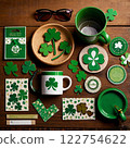 St. Patrick's Day shamrock-themed decorations on wooden table.  122754622