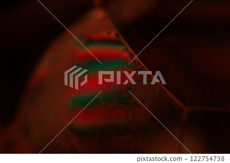 Red reflections of liquid in macro, red liquid surface, bubbles in macro, connection of bubbles in macro, cell from liquid, horror background, horror surface panels 122754738