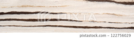 Savanna-inspired veneer surface with bold dark streaks on a creamy backdrop Savanna-inspired veneer surface with bold dark streaks on a creamy backdrop 122756029