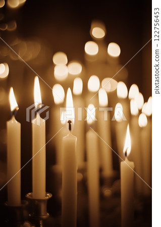 Glowing Candles Creating a Warm and Inviting Atmosphere That is Serene and Tranquil for Everyone to Enjoy 122756453