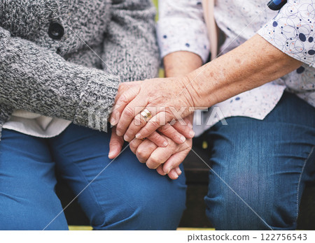 Old people, hand holding and friends for love from sad grief or loss discussion, hope chat or trust. Retired person, fingers and closeup for connection in park for solidarity help, compassion or care Old people, hand holding and friends for love from sad grief or loss discussion, hope chat or trust. Retired person, fingers and closeup for connection in park for solidarity help, compassion or care 122756543