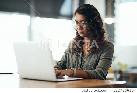 Business owner typing on laptop, checking emails and ordering new stock while sitting at a restaurant. Cafe manager, boss and entrepreneur networking online, updating social media page and website Business owner typing on laptop, checking emails and ordering new stock while sitting at a restaurant. Cafe manager, boss and entrepreneur networking online, updating social media page and website 122756636