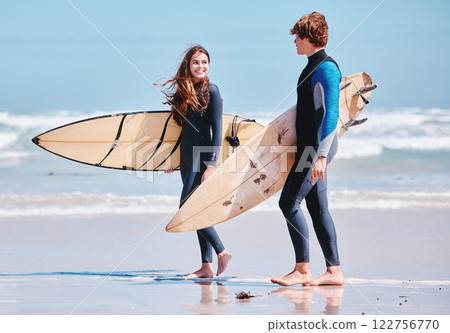 Surf, surfing and friends walking or man and woman at beach or sand talking. Surfboard, conversation and people by ocean for sport or sports, training workout and exercise for a surfers competition 122756770