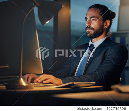 Working, typing and computer research of a seo and cryptocurrency technology developer working late. Web development of a fintech software worker planning iot and erp digital transformation at night 122756806