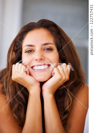 Happy face and smile with healthy mouth, teeth and good oral or dental hygiene beauty. Portrait of a woman with joyful facial expression and happiness, confident and joy while relax at home 122757431