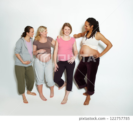 Diversity, pregnant friends and mother in studio with support or trust in pilates, health and yoga clothes in studio. Smile, happy and wellness pregnancy lifestyle with positive women portrait 122757785