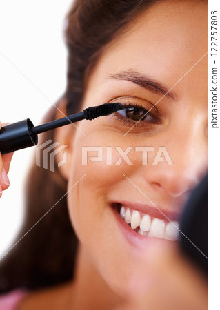 Beauty mirror, makeup and woman with eyeliner, mascara or cosmetics for lashes, eyes or face. Happy girl with skincare lifestyle uses eyelash cosmetic product for facial and skin care routine closeup 122757803