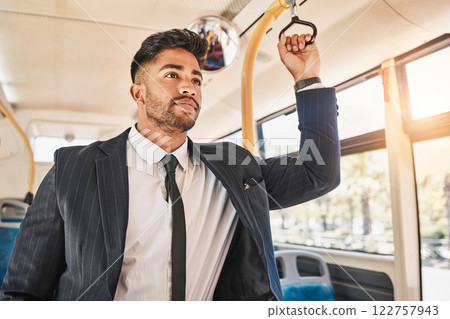 Business man, commuting and bus travel with public transport. Travelling person in formal suit alone in urban transportation. Professional and dedicated worker standing in moving vehicle. 122757943