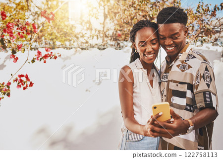 Happy, phone and excited couple taking a selfie outdoors with a smartphone while on vacation or holiday. Joyful lovers on a video call or sharing a picture or a photo online or on social media 122758113