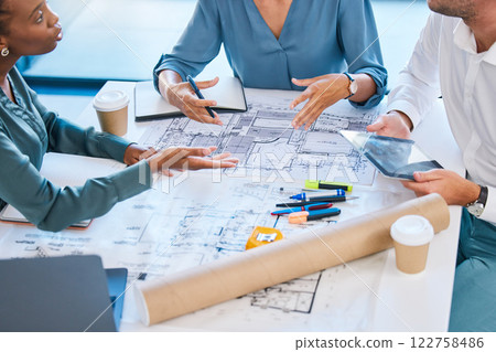 Blueprints, architects and building engineers talking, meeting and planning renovation, remodeling or floor plan with tablet. Diverse group of designers arguing over structure design and vision ideas 122758486