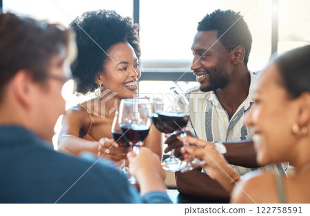 Friendship, celebration and luxury wine toast with a fun group at an event or restaurant, bonding and talking. Happy, diverse friends enjoying a wine tasting and fine dining, celebrating good news Friendship, celebration and luxury wine toast with a fun group at an event or restaurant, bonding and talking. Happy, diverse friends enjoying a wine tasting and fine dining, celebrating good news 122758591