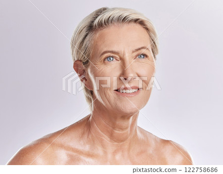 Skincare, beauty and wellness in retirement, a senior woman isolated against a pink background in a studio. Happy elderly female with a good skin care and healthy routine is self care for your face. Skincare, beauty and wellness in retirement, a senior woman isolated against a pink background in a studio. Happy elderly female with a good skin care and healthy routine is self care for your face. 122758686
