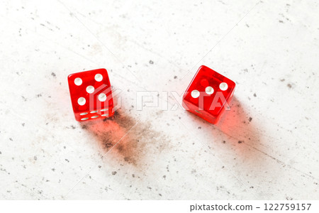 Two red craps dices showing Easy Eight (number 5 and 3) overhead shot on white board 122759157
