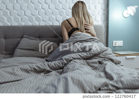 Sexy couple in bed. Human sexual activity. In reality, a man has sex with a girl 122760417