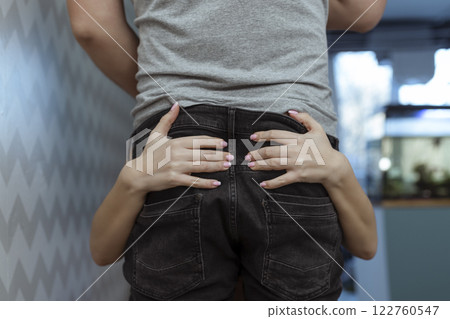 Work with your mouth. Sexy girl rubs the zipper on her partner's jeans for oral sex 122760547