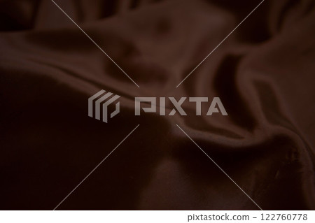 abstract background,  a wallpaper, fabric waves, color gradient, silk, satin Mocha Mousse color 122760778