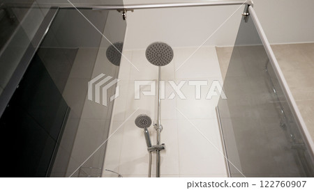 Modern shower head in contemporary bathroom 122760907