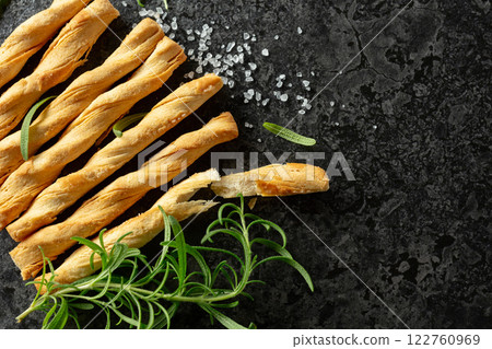 Homemade grissini breadsticks with sea salt and rosemary. Homemade grissini breadsticks with sea salt and rosemary. 122760969