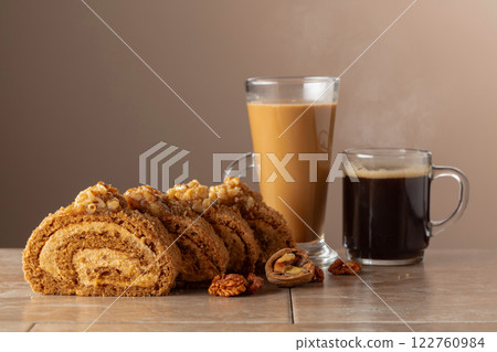 Walnut and buttercream roll: a traditional Oriental pastry. Walnut and buttercream roll: a traditional Oriental pastry. 122760984