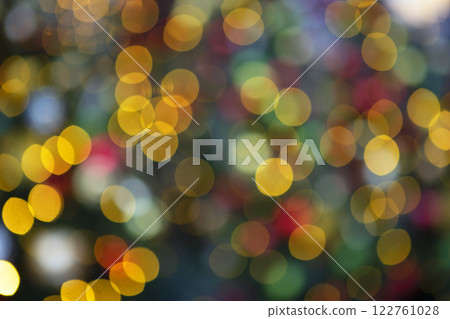 Garland of lights is out of focus. Texture for postcards. Place for advertising. Background for greetings. 122761028
