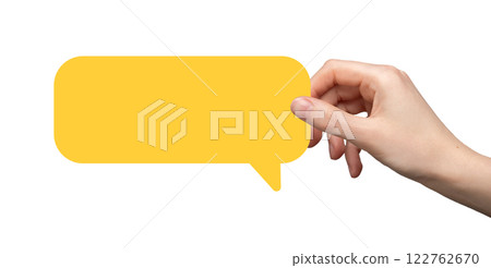 Hand holding a yellow speech bubble, symbolizing communication, dialogue, and sharing opinions. Hand holding a yellow speech bubble, symbolizing communication, dialogue, and sharing opinions. 122762670