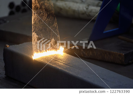 Close up scene rust cleaning process by portable laser cleaning machine. 122763390