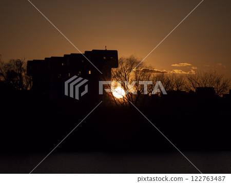 Riverside town landscape at dusk Riverside town landscape at dusk 122763487