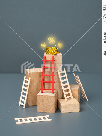 Stacks of coins on top of a pedestal. Financial goal. Wealth accumulation, investment growth, economic achievement, financial planning, personal savings goals, reaching monetary milestones Stacks of coins on top of a pedestal. Financial goal. Wealth accumulation, investment growth, economic achievement, financial planning, personal savings goals, reaching monetary milestones 122763987