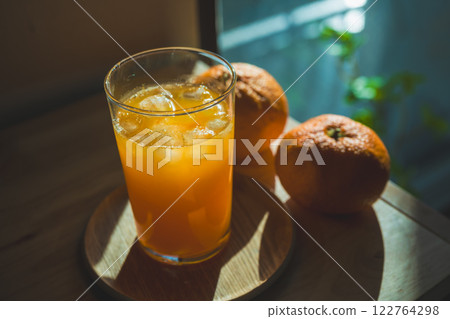 Freshly squeezed homemade mandarin juice Freshly squeezed homemade mandarin juice 122764298