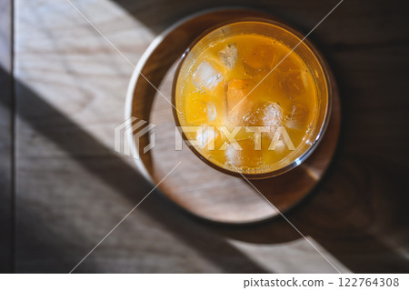 Freshly squeezed homemade mandarin juice Freshly squeezed homemade mandarin juice 122764308