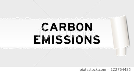 Ripped gray paper background that have word carbon emissions under torn part 122764425