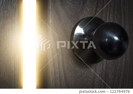 The light through the open door 122764976