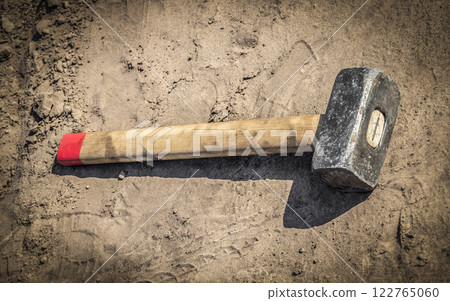 Hammer on the sand during rest Hammer on the sand during rest 122765060