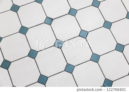 Vintage stone mosaic floor tiling with white and green squares pattern Vintage stone mosaic floor tiling with white and green squares pattern 122766801