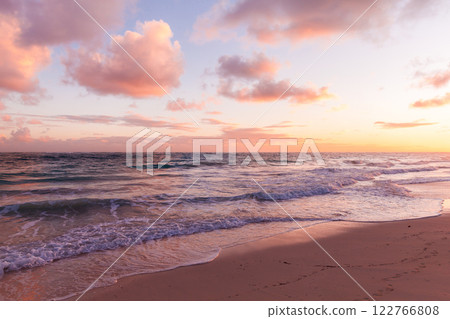 Coastal landscape of an empty sandy beach and shore waves 122766808
