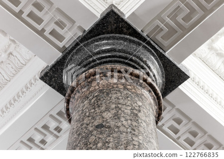 Classical portico fragment with granite pillar top. Antique style 122766835