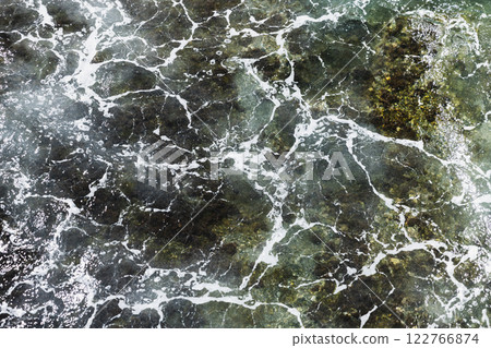Stormy shallow sea water with waves and foam, top view Stormy shallow sea water with waves and foam, top view 122766874