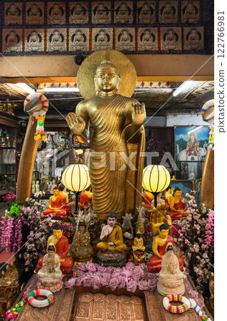 Buddha statue. Gangaramaya Temple, Colombo, Sri Lanka 122766981