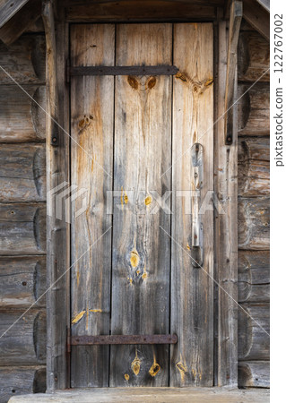Old rural brown wooden door, background texture 122767002