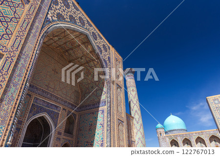 View of Registan square, Samarkand, Uzbekistan. Portal and minaret 122767013