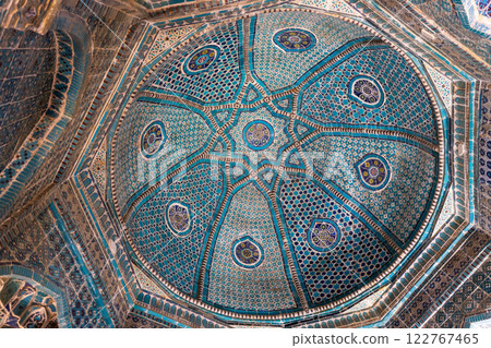 Decorated blue ceiling vault of an ancient mausoleum of Shah-i-Zinda 122767465