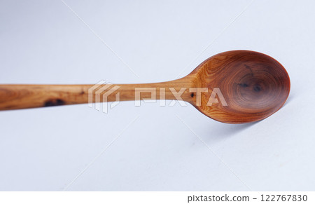 Wooden kitchen utensils stacked view close up 122767830