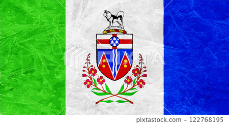 Official flag of the Yukon. Territory of Canada. Conceptual collage on ice texture Official flag of the Yukon. Territory of Canada. Conceptual collage on ice texture 122768195