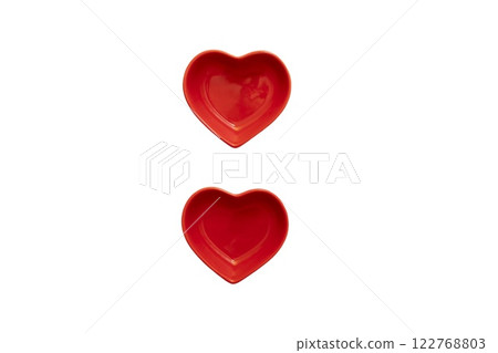 Two red heart shaped plates isolated on transparent or white background Two red heart shaped plates isolated on transparent or white background 122768803
