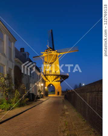 Windmill in the Netherlands. Old historical buildings. Architectural landscape. Windmill in the Netherlands. Old historical buildings. Architectural landscape. 122769118