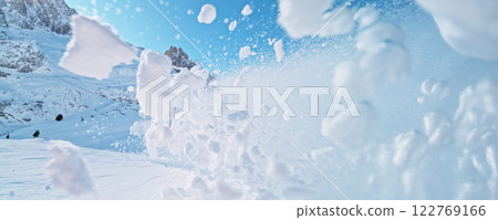 White powder explosion with high mountains on background. White powder explosion with high mountains on background. 122769166
