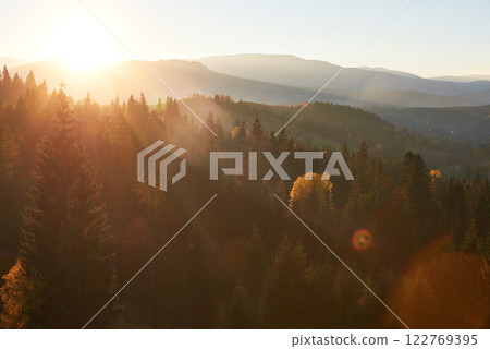 Beautiful autumn morning on the view point above the deep forest valley in Carpathians, Ukraine, Europe 122769395